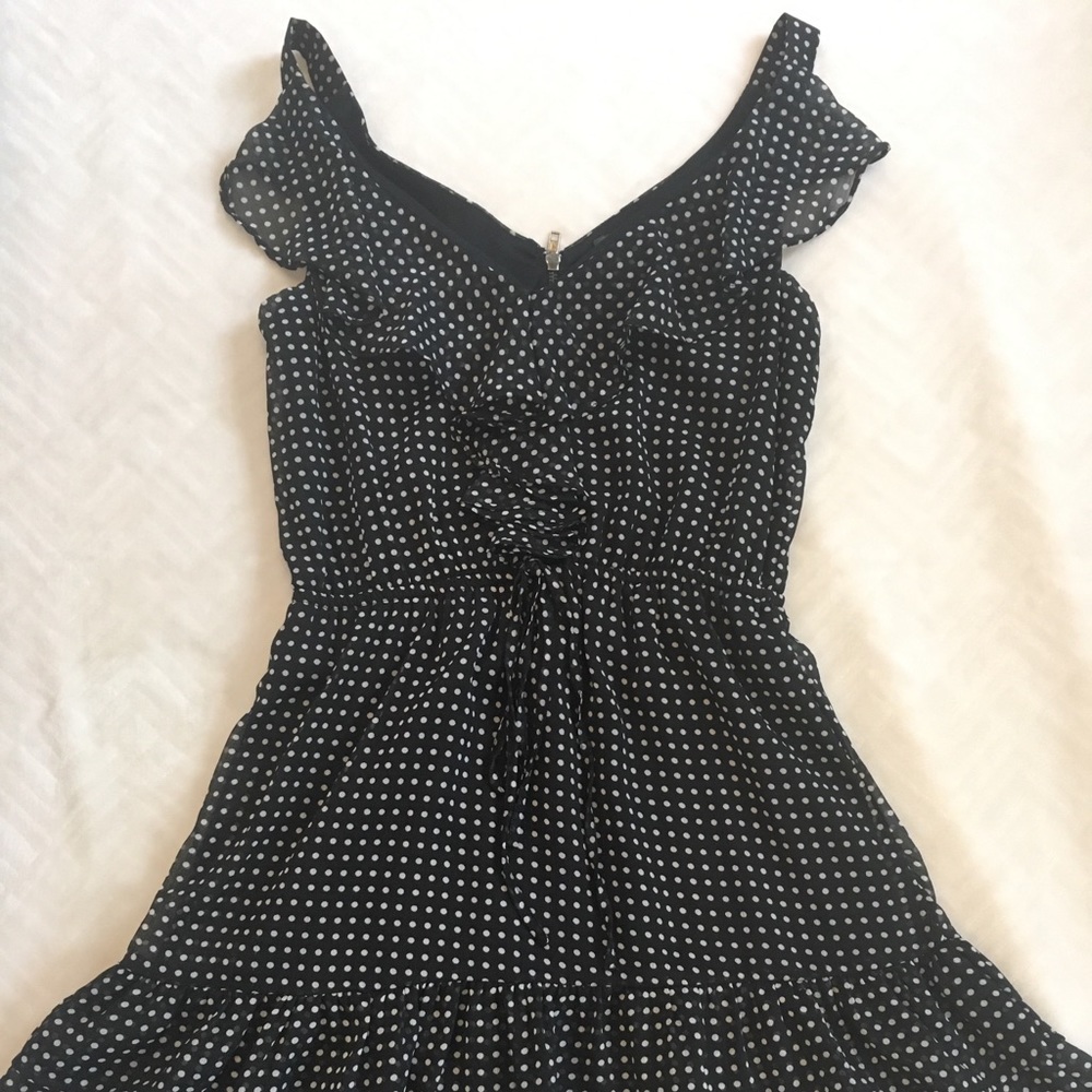 Back and white polka-dot ruffled dress